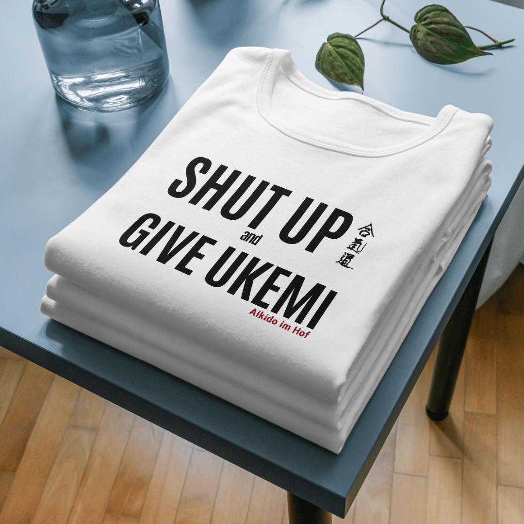 Stapel Tshirts mit Aufdruck Shut up and take ukemi